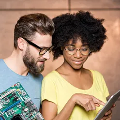 Couple choosing IPTV plan on tablet